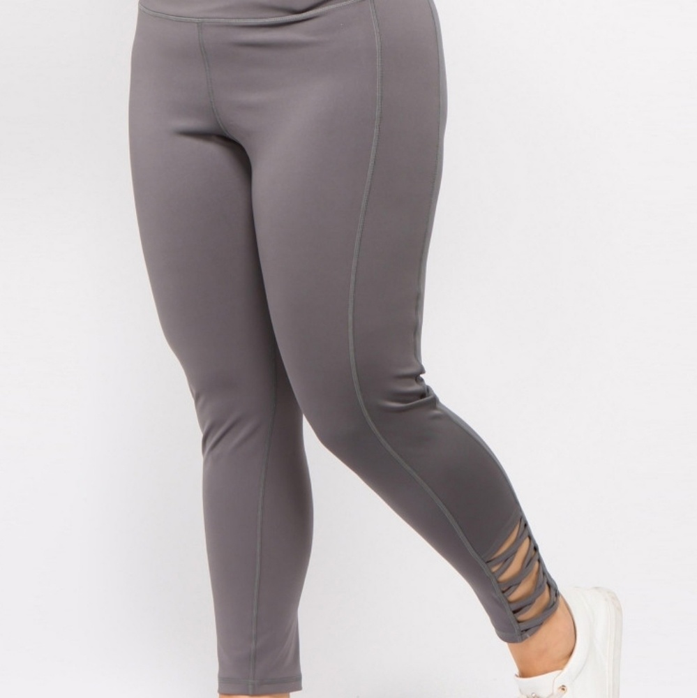 NWT Active leggings with criss cross bottom.